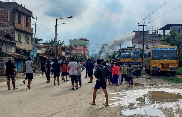 Street in Manipur with smoke visible during the ethnic violence crisis